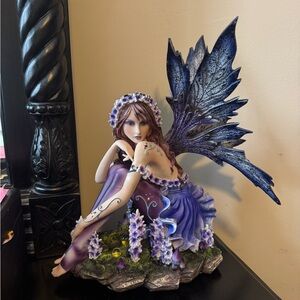 Purple Fairy Figurine with Floral Accents